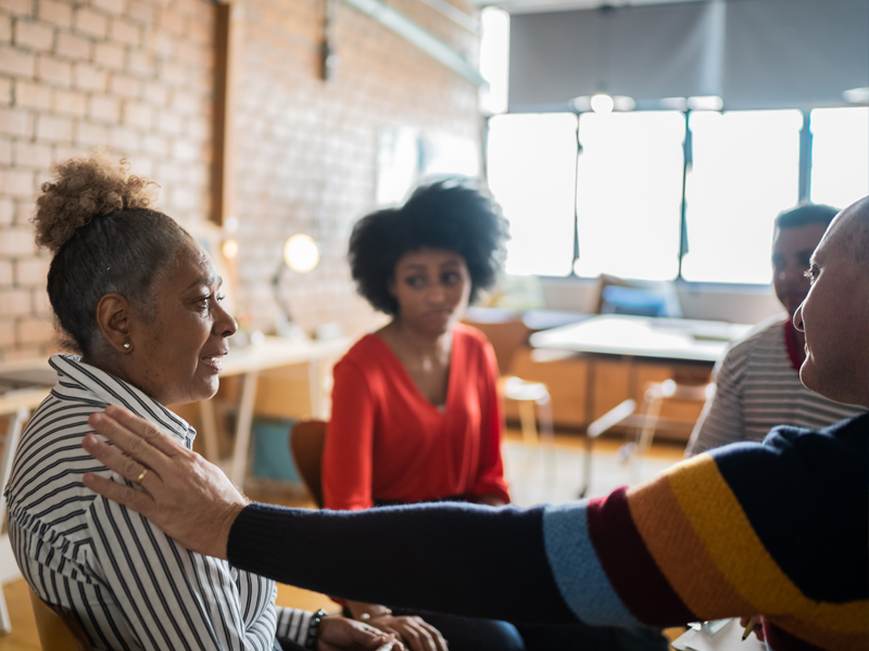 Photo of a woman in a counseling session. Photo credit: Getty Images.